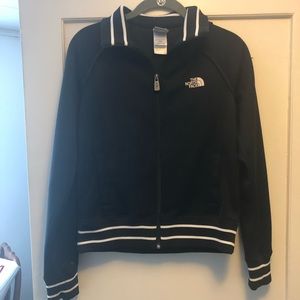 Authentic women’s The North Face zip-up size med